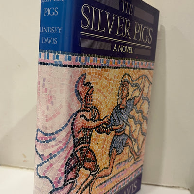 The Silver Pigs by Lindsey Davis Hardcover/Dust Jacket, 1st UK Edition/1st Printing