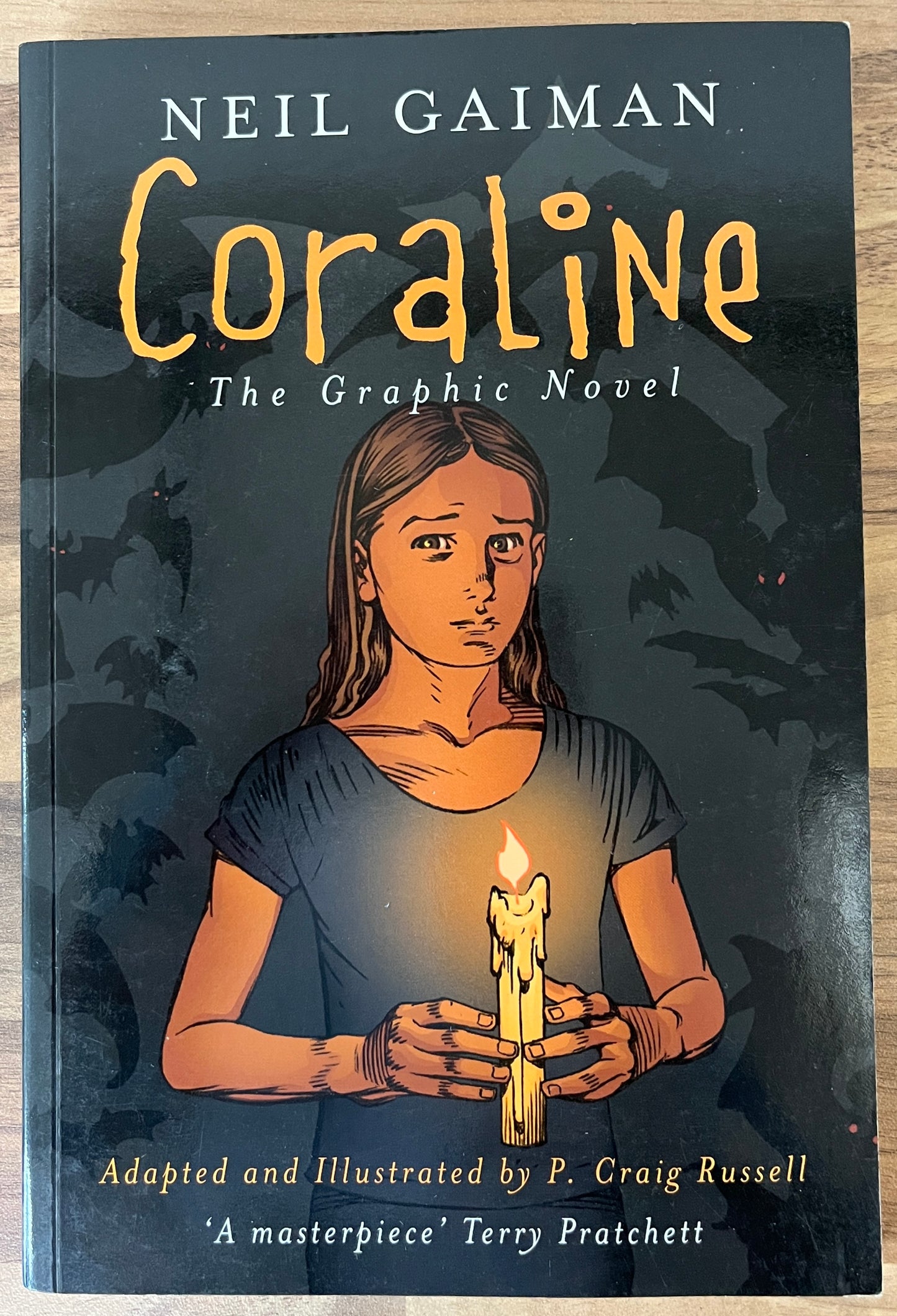 Coraline: The Graphic Novel by Neil Gaiman
